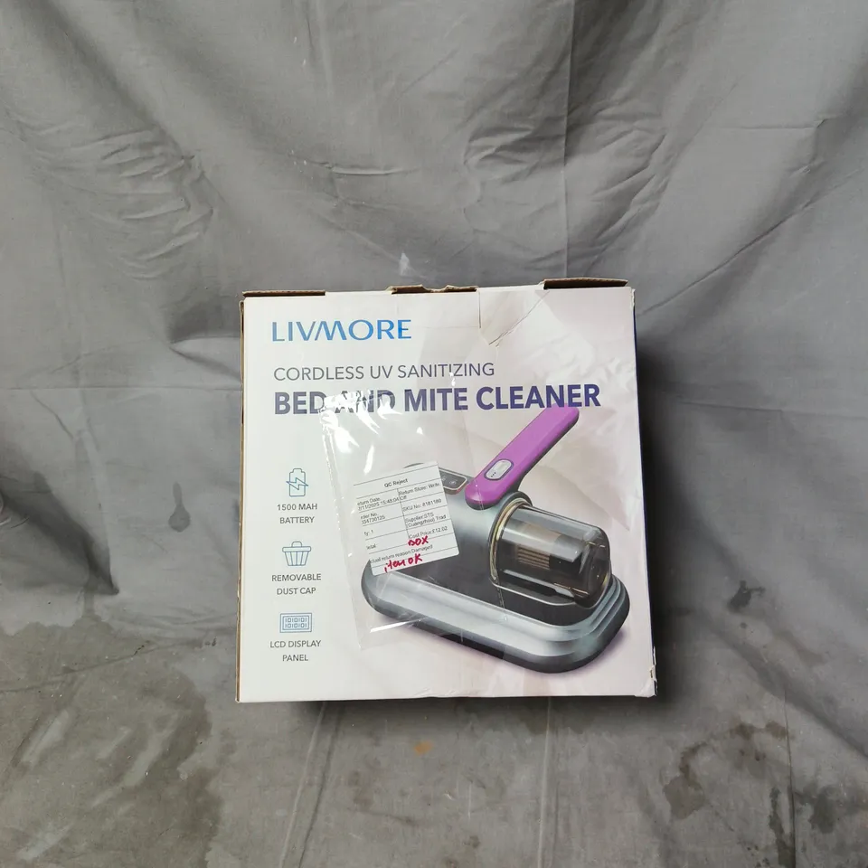 LIVMORE CORDLESS UV SANITISING BED END MITE CLEANER – BASE UNIT WITH PINK HANDHELD WAND, BOXED