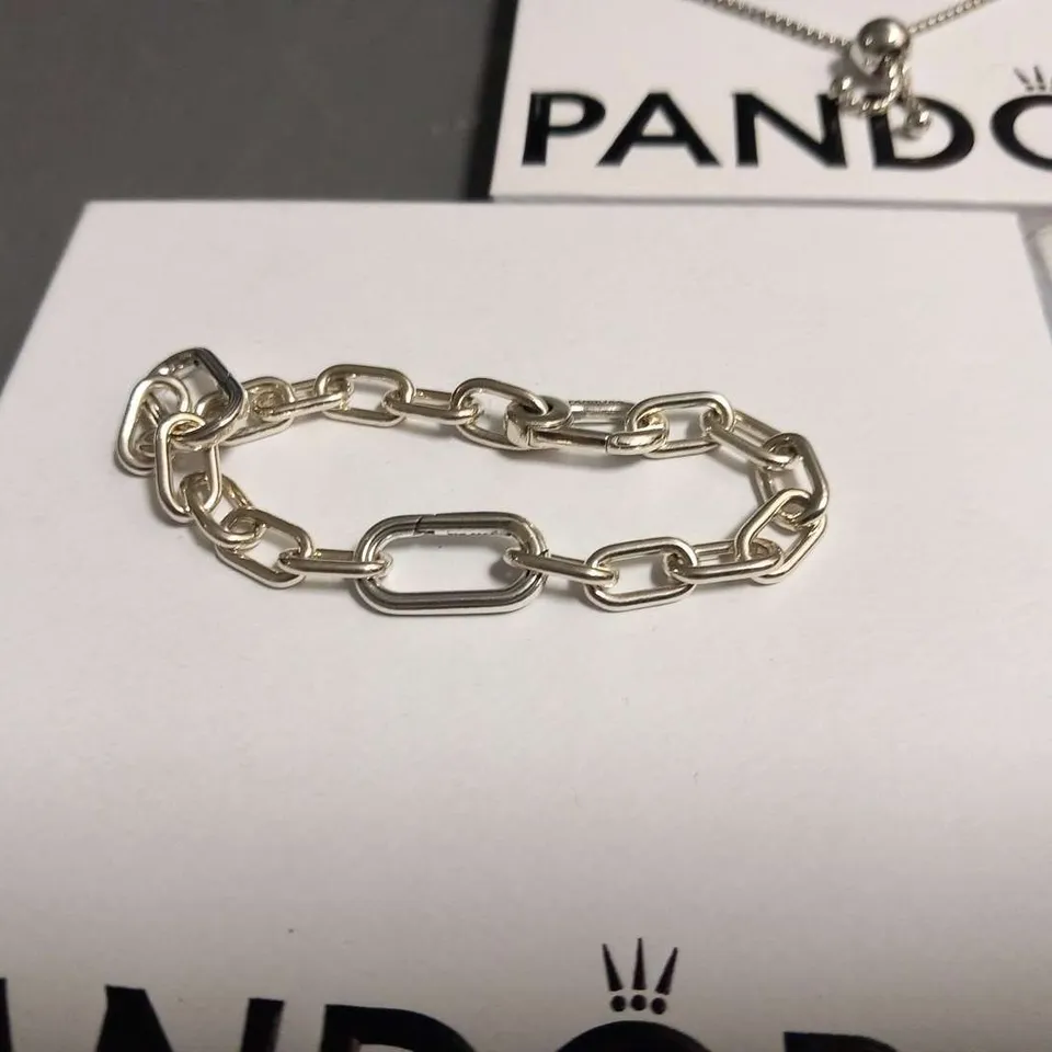 FOUR ASSORTED PANDORA PRODUCTS TO INCLUDE; BRACELTS AND CHARMS