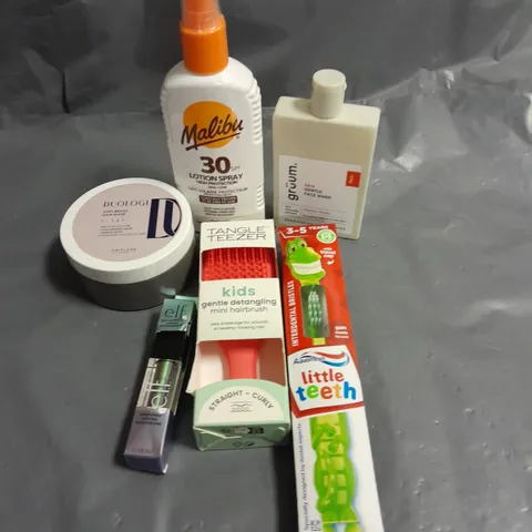 APPROXIMATELY 20 ASSORTED HEALTH & BEAUTY PRODUCTS TO INCLUDE MALIBU LOTION SPRAY, GRUUM FACE WASH AND ELF LIQUID EYESHADOW