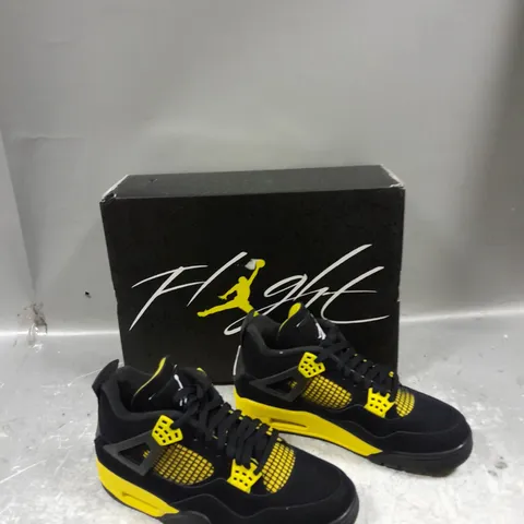 BOXED PAIR OF NIKE AIR JORDAN 4 RETRO BLACK / YELLOW UK 6.5