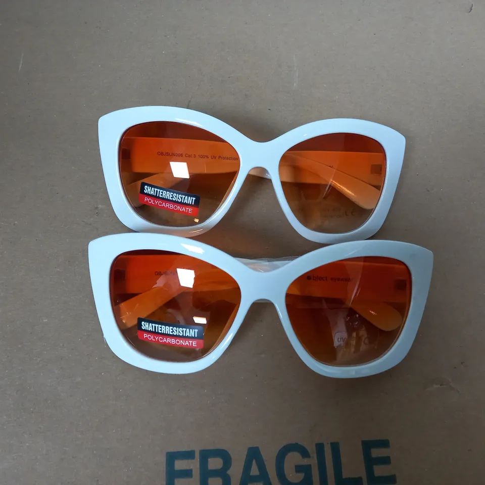 BOX OF WHITE TINTED LENS SUN GLASSES