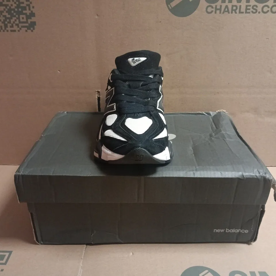 BOXED PAIR OF NEW BALANCE 9060 TRAINERS BLACK/WHITE SIZE UK 4.5