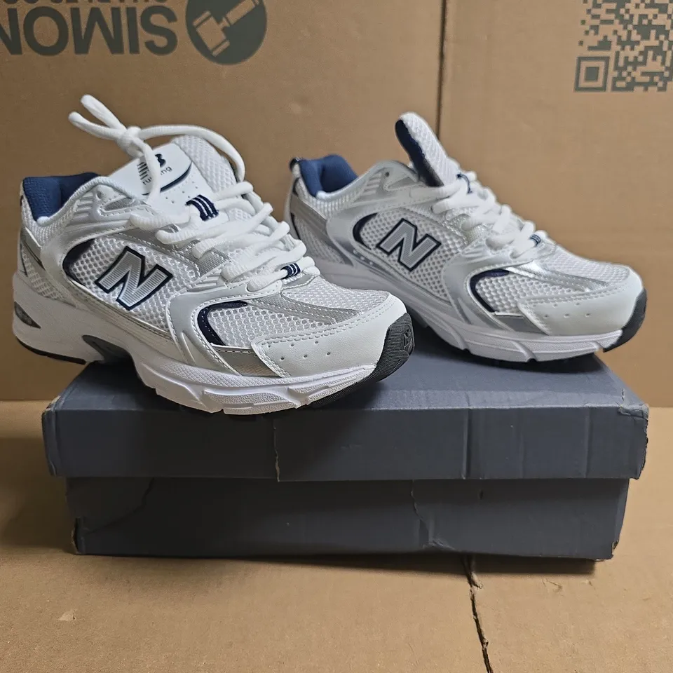 BOXED PAIR OF NEW BALANCE 530 TRAINERS IN WHITE/NAVY SIZE UK 5.5