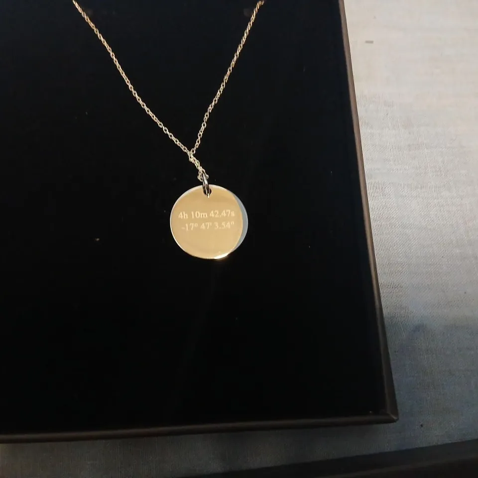TREASURE NECKLACE WITH CIRCULAR COORDINATE PENDANT ON CHAIN