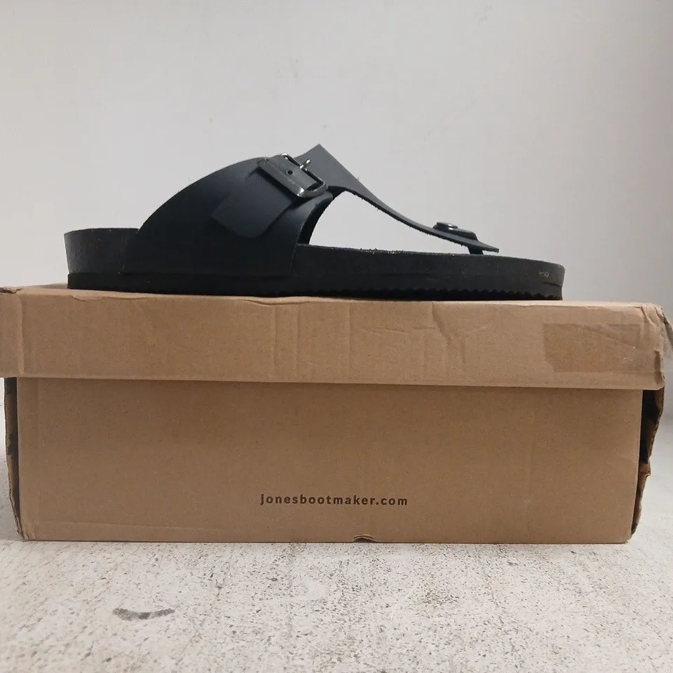 BOXED PAIR OF JONES TOE-POST SANDALS IN BLACK SIZE UK 9