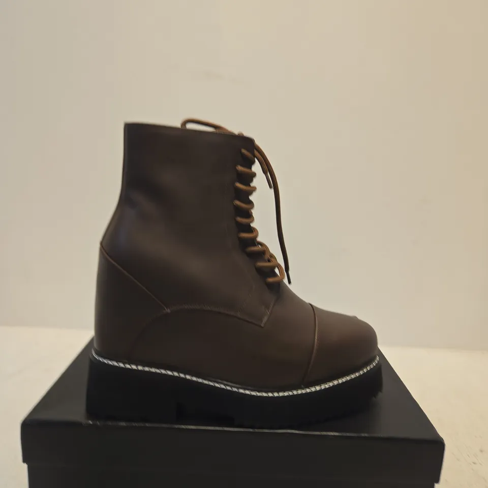 BOXED PAIR OF CHAMARIPA HIGH WEDGE BROWN BOOTS - SIZE UNSPECIFIED