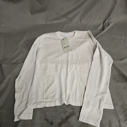 SWEATY BETTY MINDFUL FLEX CROP LONG SLEEVE TOP IN CLOUD WHITE/DUSTY BEIGE SIZE L