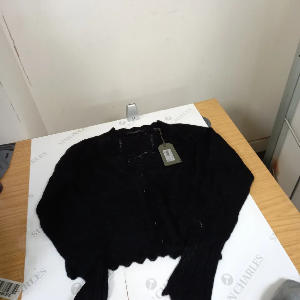 box of assorted clothing items socks, boxers, jumpers etc