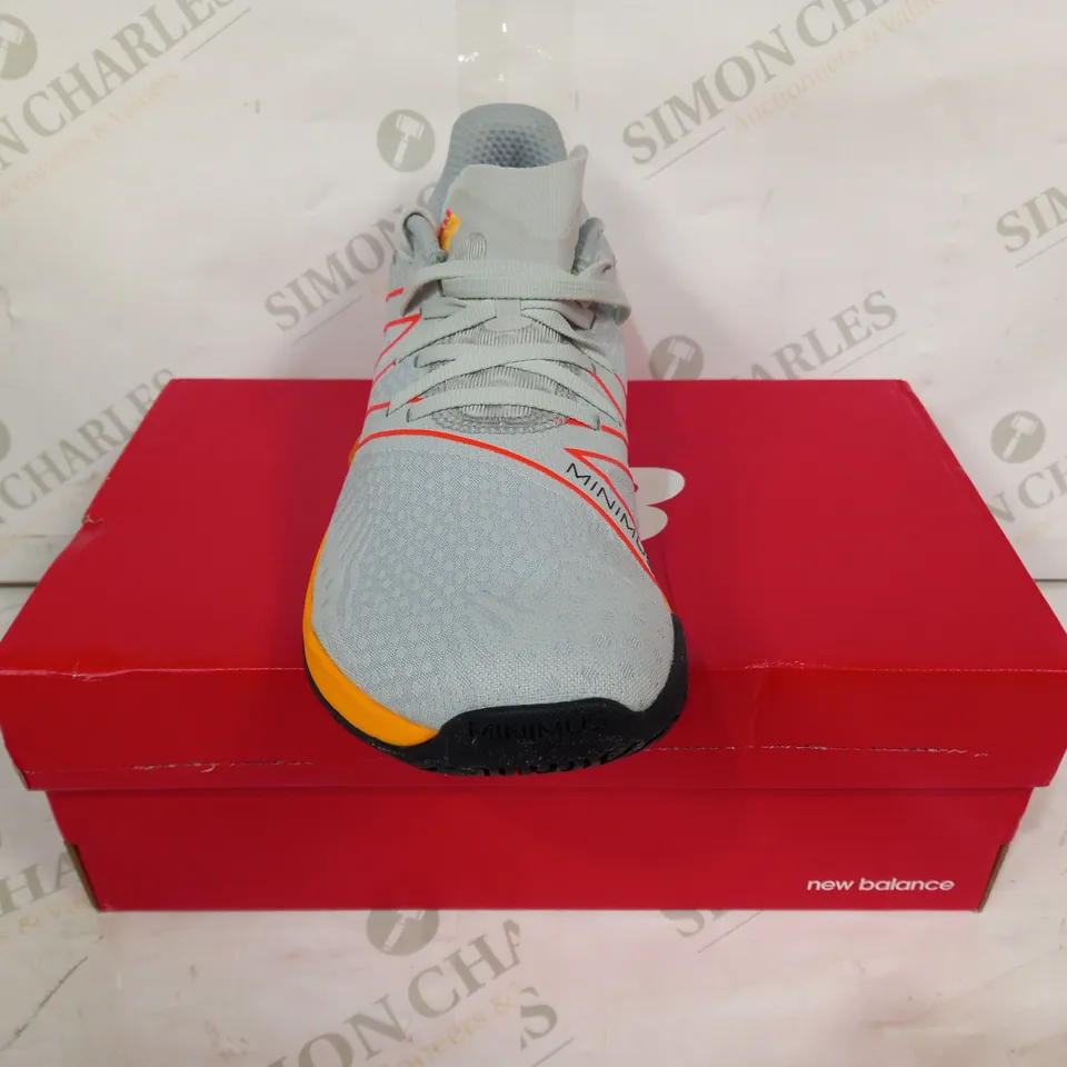 BOXED PAIR OF NEW BALANCE MINIMUS TRAINERS IN GREY/RED/ORANGE UK SIZE 9