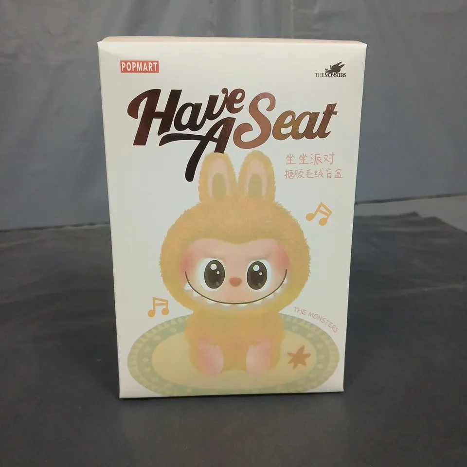POP MART HAVE A SEAT VINYL FIGURE – THE MONSTERS (BOXED)