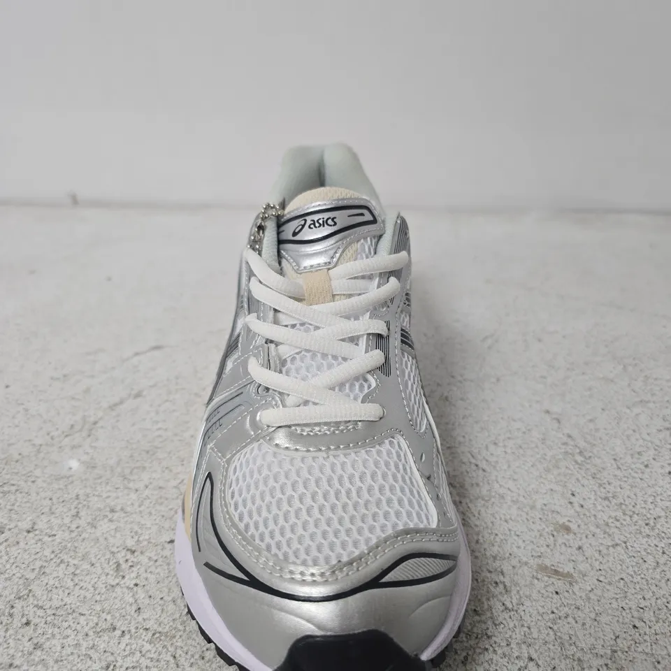 PAIR OF ASICS RUNNING SHOES – SILVER - UK SIZE 7
