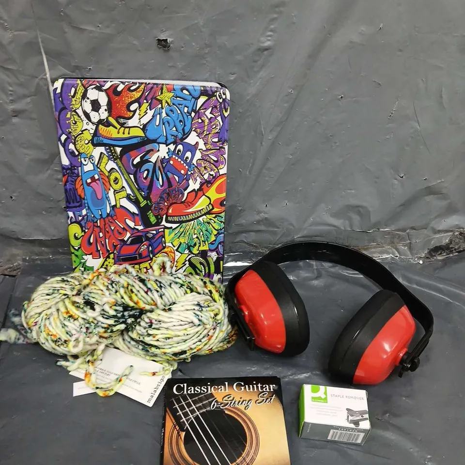 TOTE OF APPROXIMATELY 15 HOUSEHOLD ITEMS TO INCLUDE - TABLET COVER - EAR DEFENDERS - GUITAR STRINGS