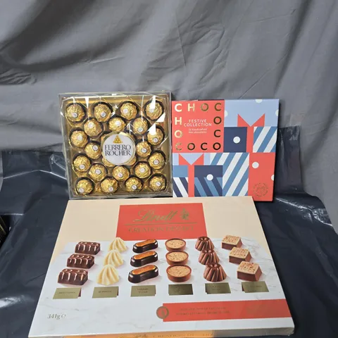 BOX OF APPROXIMATELY 10 BOXES OF ASSORTED CHOCOLATES AND ADVENT CALENDARS TO INCLUDE TOBLERONE, LINDT AND FERRERO ROCHER