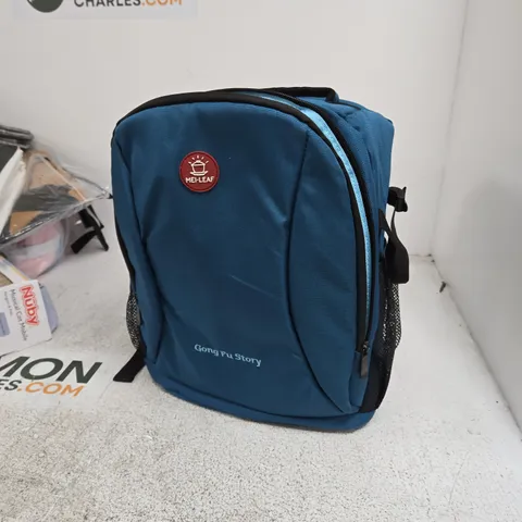 BLUE RUCKSACK WITH GONG FU STORY LOGO AND MEI-LEAF BADGE