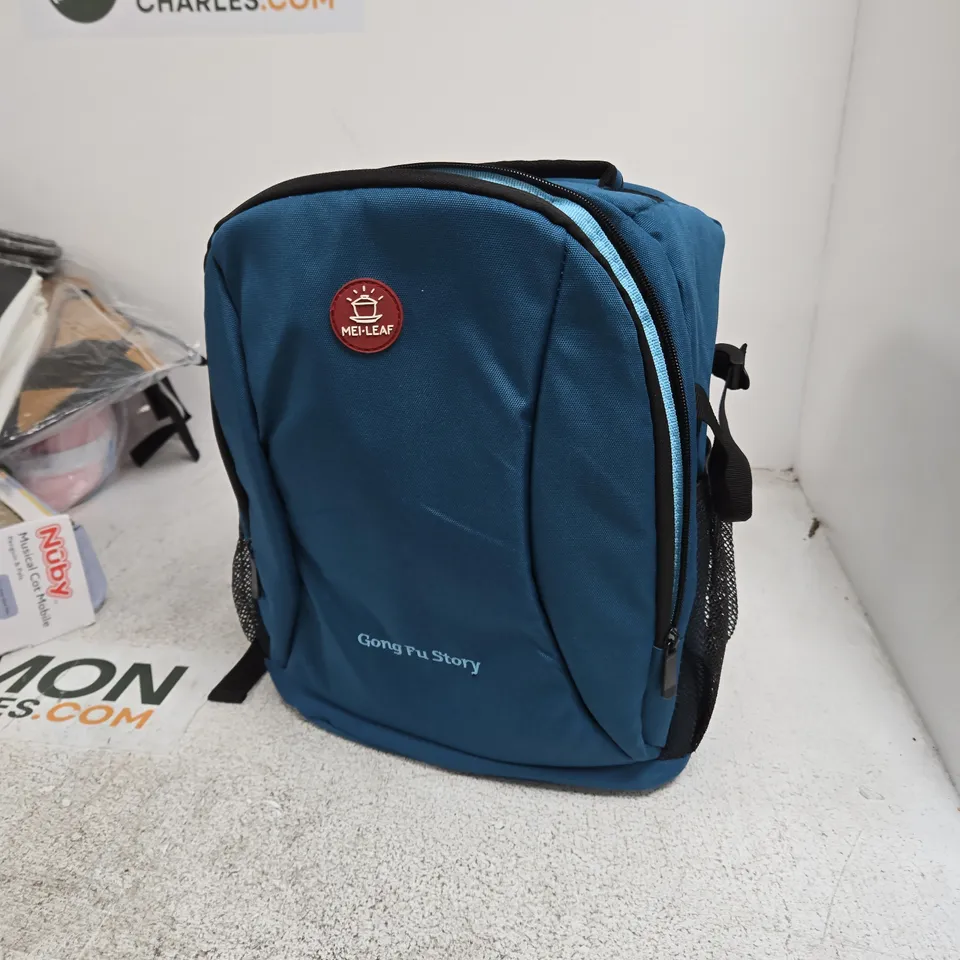 BLUE RUCKSACK WITH GONG FU STORY LOGO AND MEI-LEAF BADGE 