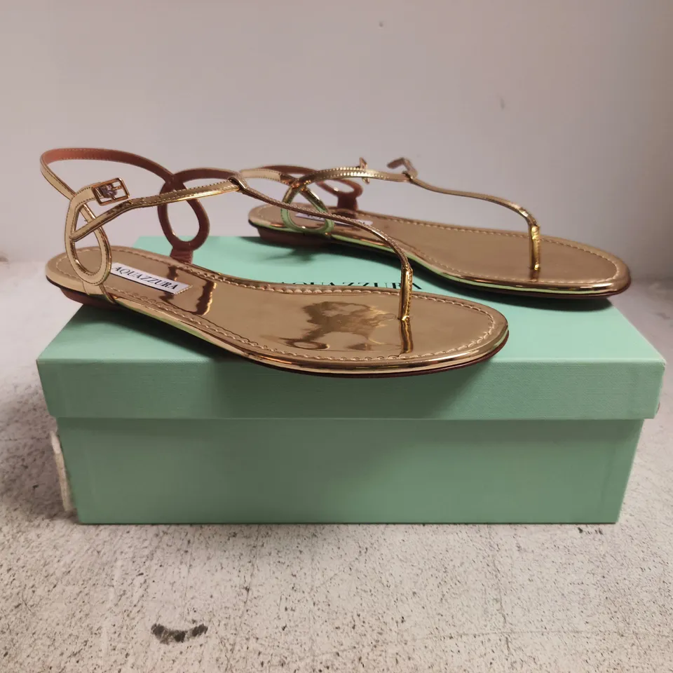 BOXED PAIR OF AQUAZZURA FLAT TOE-POST SANDALS IN METALLIC GOLD SIZE EU 39.5
