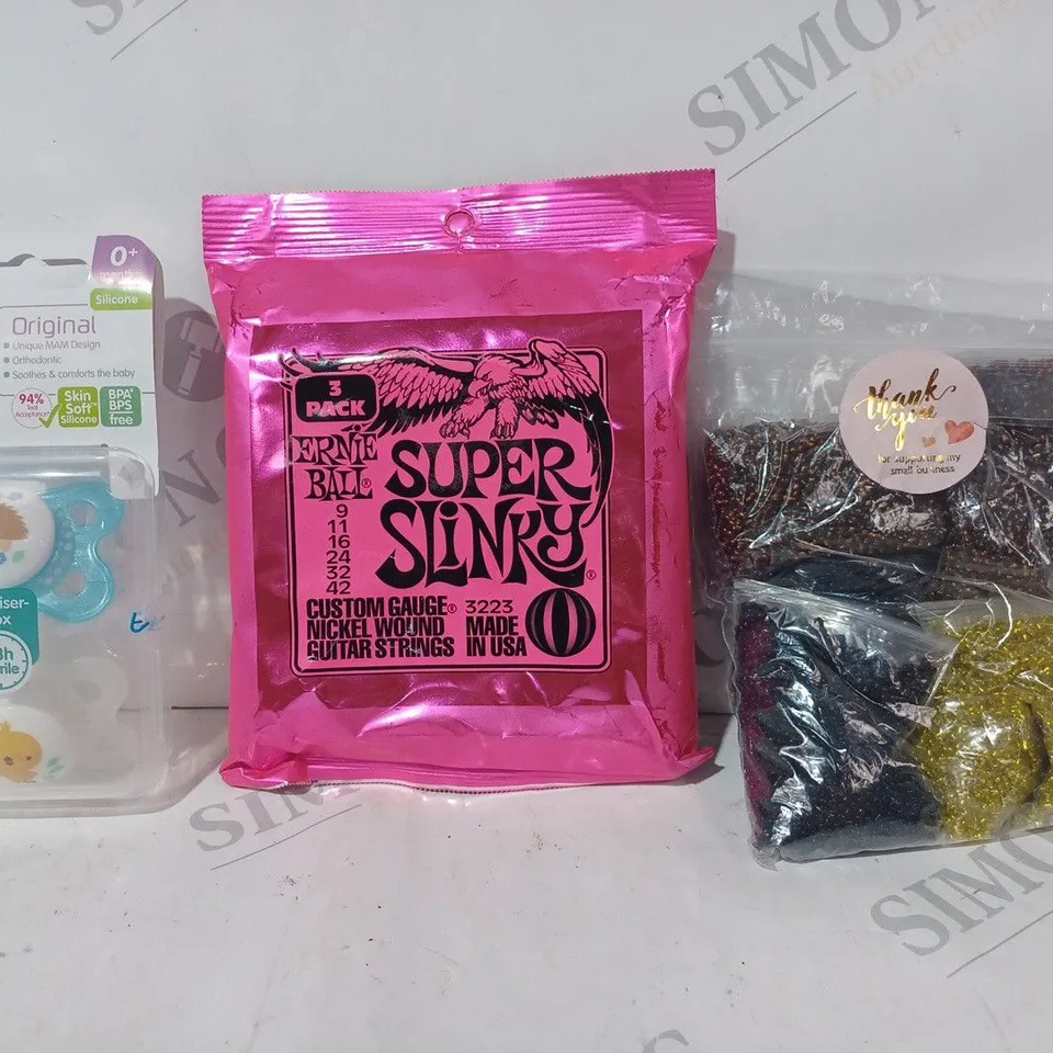 APPROXIMATELY 15 ASSORTED HOUSEHOLD ITEMS TO INCLUDE ERNIE BALL SUPER SLINKY GUITAR STRINGS, NAM SILICONE SOOTHERS, ETC