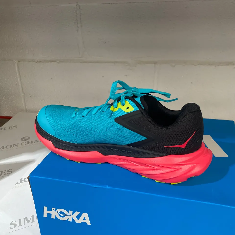 BOXED PAIR OF HOKA TEAL TRAINERS SIZE 7.5