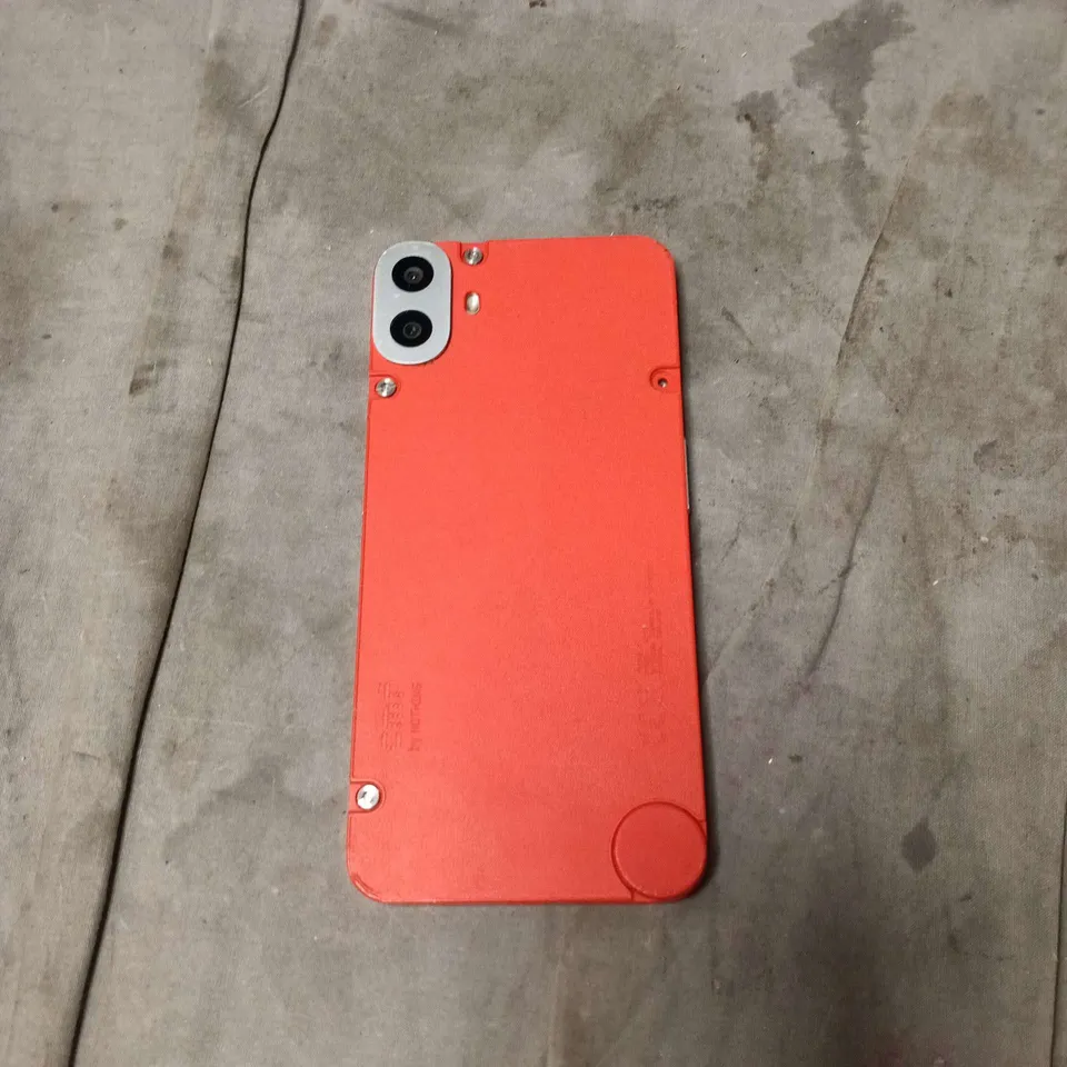 CMF BY NOTHING ANDROID PHONE. ORANGE BACK. SCREEN CRACKED