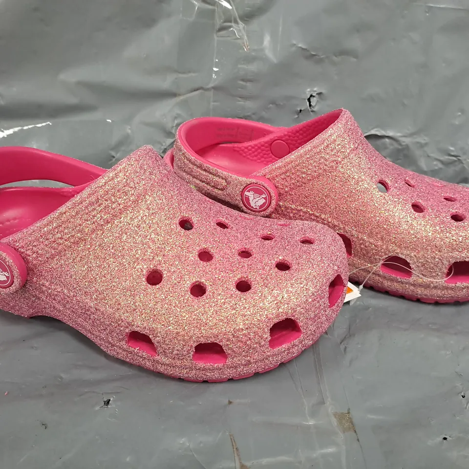 PAIR OF CROCS CLASSIC IRIDESCENT GLITTER CLOGS IN PINK/MULTI SIZE UK C12