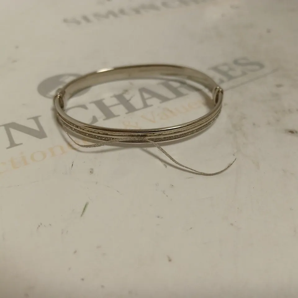 FAITH AND BROWN STERLING SILVER RUNWAY DOUBLE STARDUST BANGLE. 