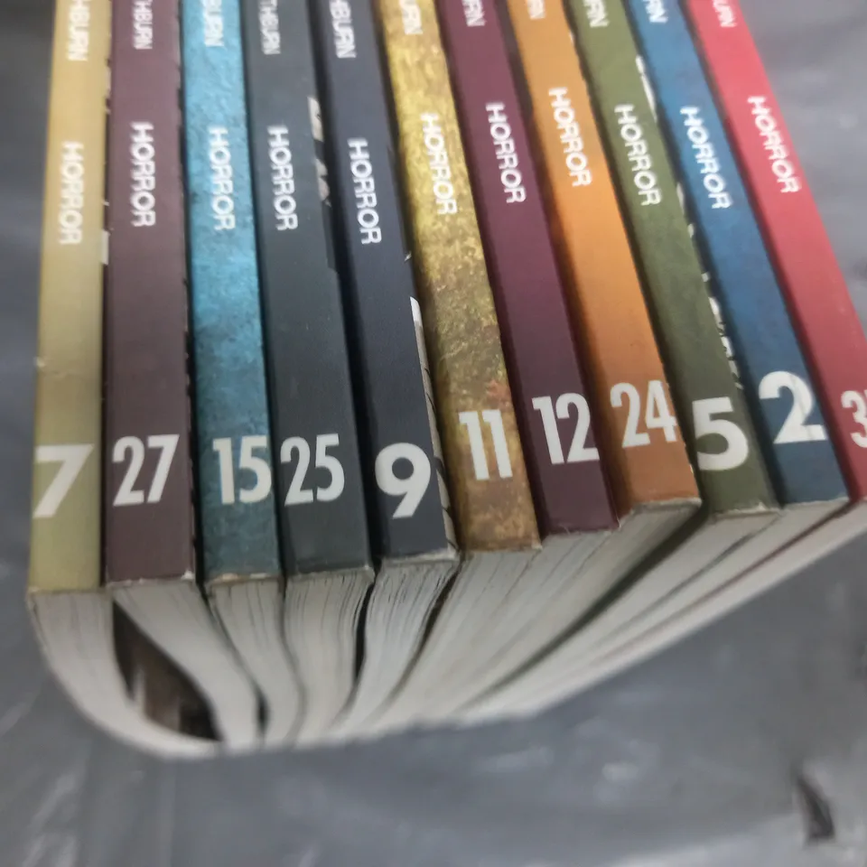 LOT OF 11 THE WALKING DEAD GRAPHIC NOVELS - VOLUMES 2/5/7/9/11/12/15/24/25/27/31