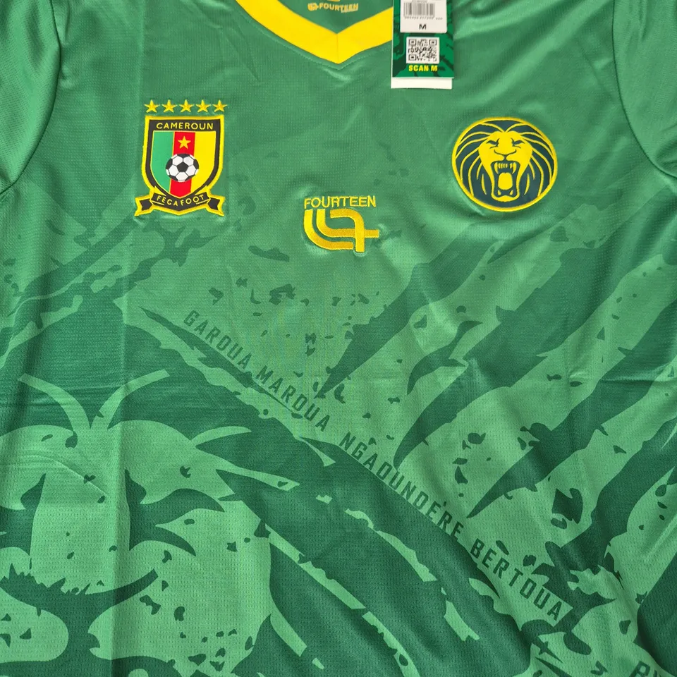 FOURTEEN CAMEROON-STYLE GREEN FOOTBALL JERSEY – SIZE UK MEDIUM (M) – LIONS CREST