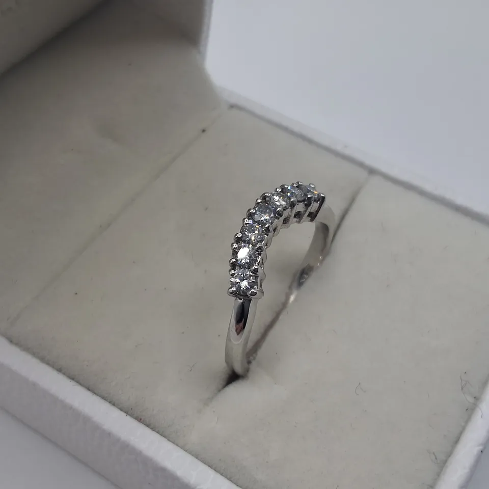 PLATINUM SEVEN STONE CURVED HALF ETERNITY RING SET WITH NATURAL DIAMONDS