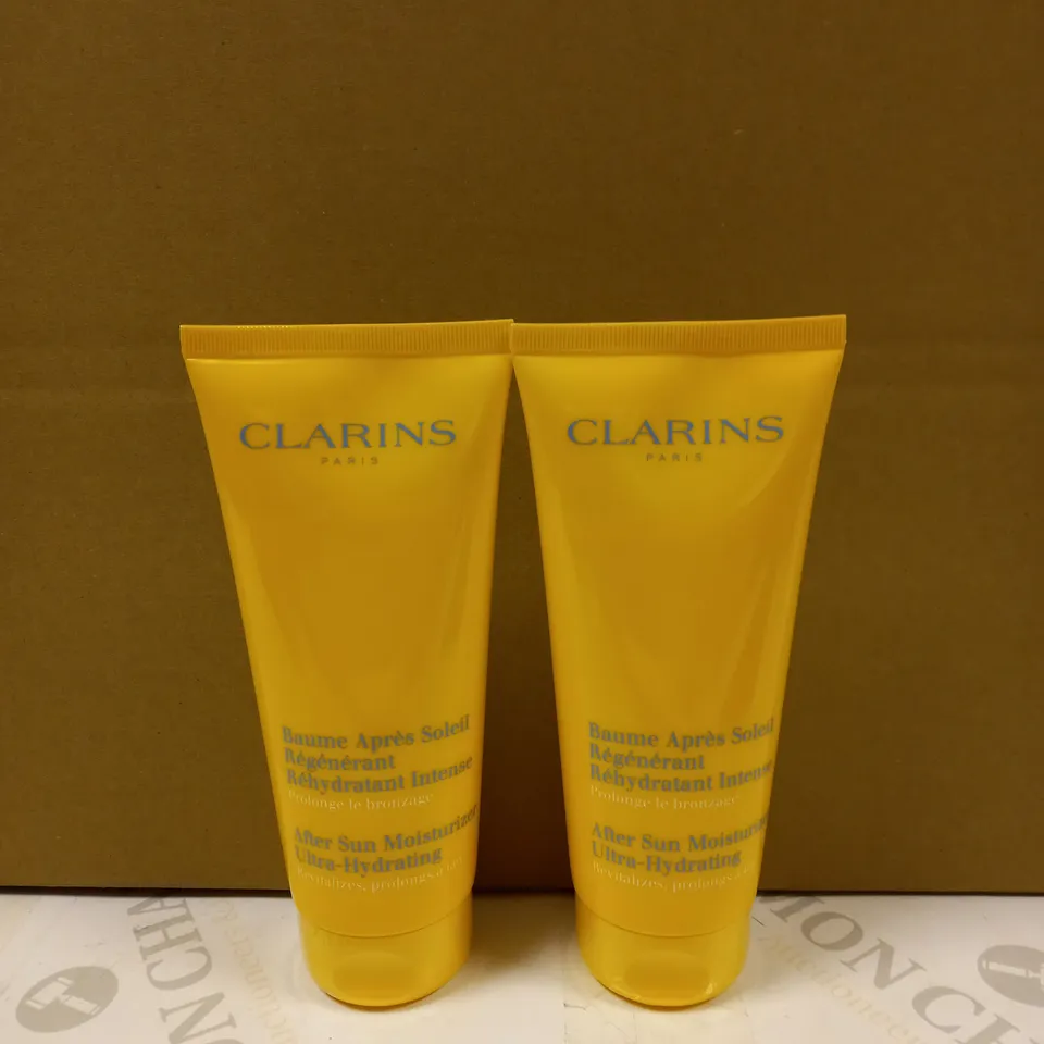 LOT OF 2 CLARINS AFTER SUN MOISTURISER 