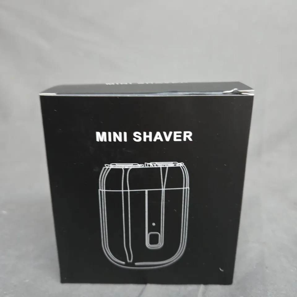 TOTE OF APPROXIMATELY 20 MINI SHAVERS