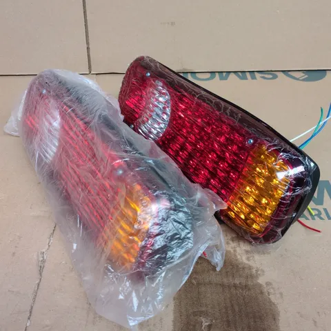 PAIR OF CAR TAIL LIGHT ASSEMBLIES