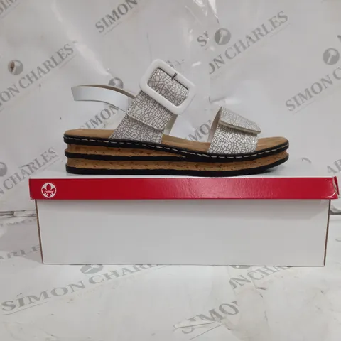BOXED PAIR OF WEDGE SANDALS IN WHITE SIZE 7