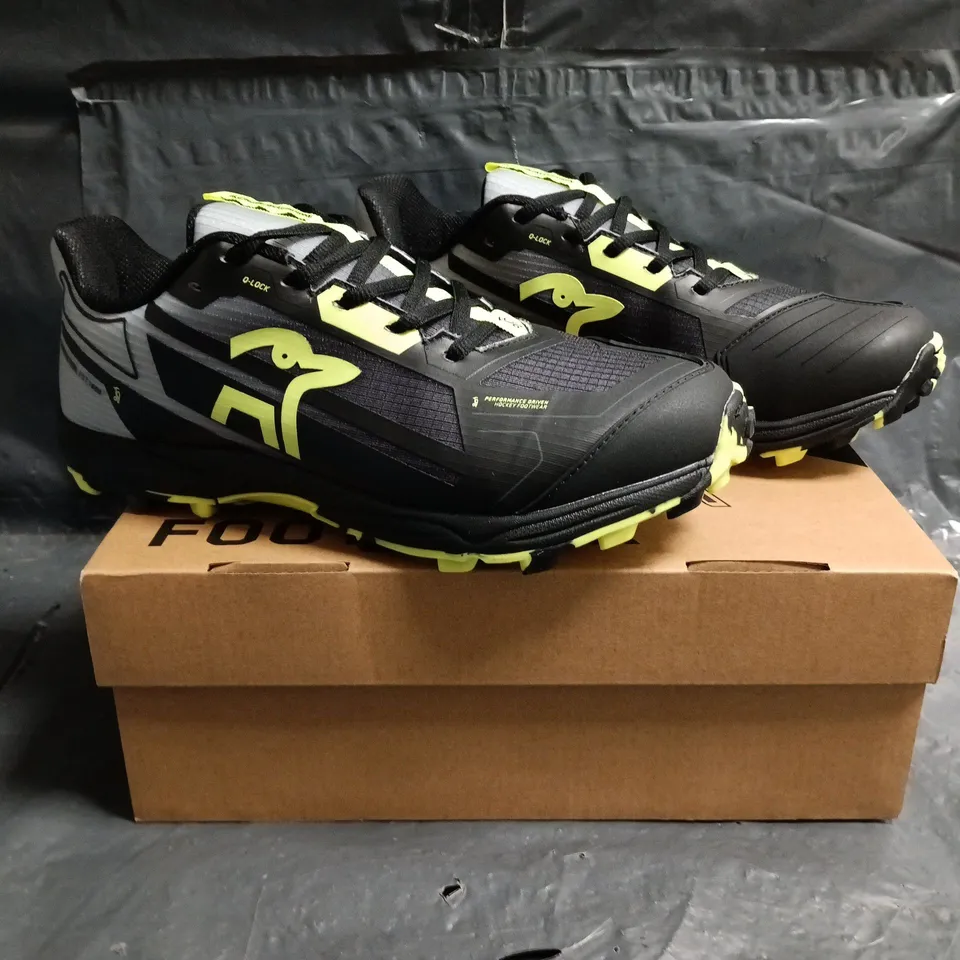 BOXED PAIR OF KOOKABURRA TRAINERS IN BLACK/LIME SIZE UK 7