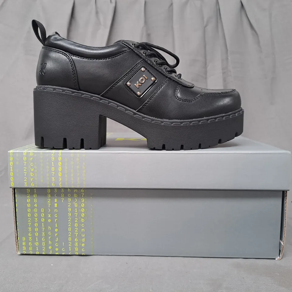 BOXED PAIR OF KOI OSHAN SWITCH SHOES IN BLACK UK SIZE 5