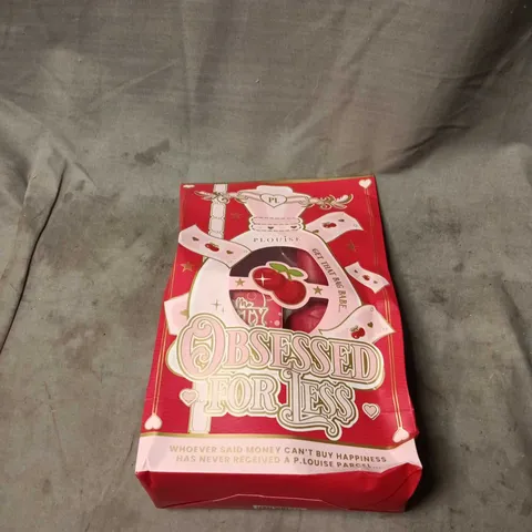 PLOUISE OBSESSED FOR LESS GIFT BAG. APPROXIMATELY 3 ITEMS