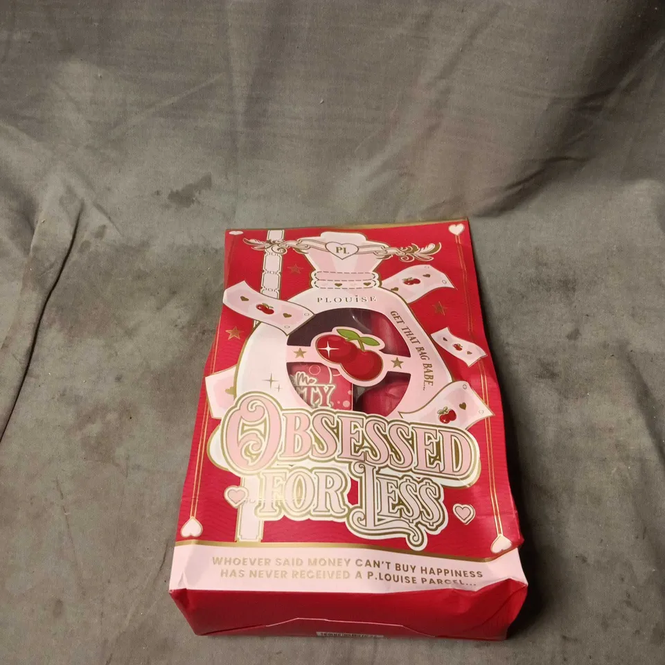 PLOUISE OBSESSED FOR LESS GIFT BAG. APPROXIMATELY 3 ITEMS