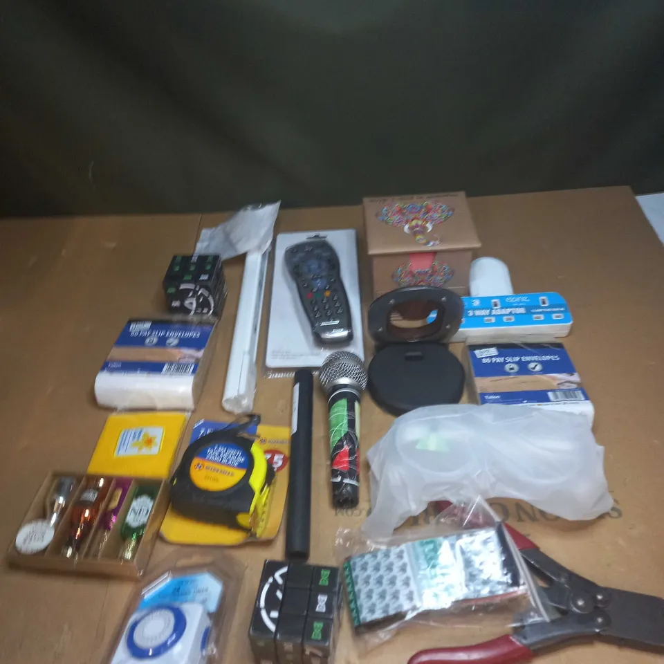 LOT OF ASSORTED ITEMS TO INCLUDE REMOTE CONTROLS, TOOLS AND 3 WAY PLUG ADAPTOR