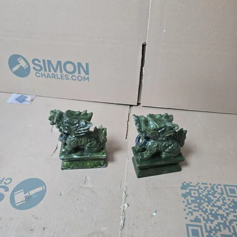 PAIR OF GREEN DRAGON FIGURINES ON SQUARE PEDESTALS 