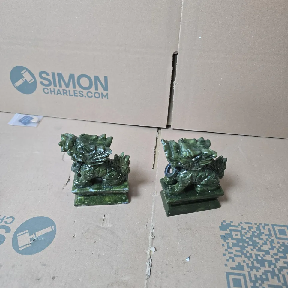 PAIR OF GREEN DRAGON FIGURINES ON SQUARE PEDESTALS 