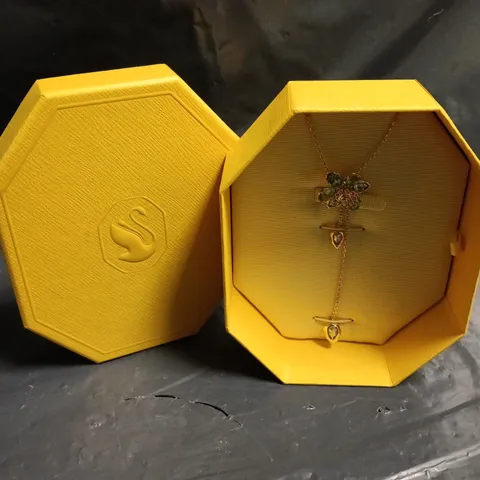 SWAROVSKI FLORAL PENDANT NECKLACE WITH GREEN STONES AND PINK CENTRE