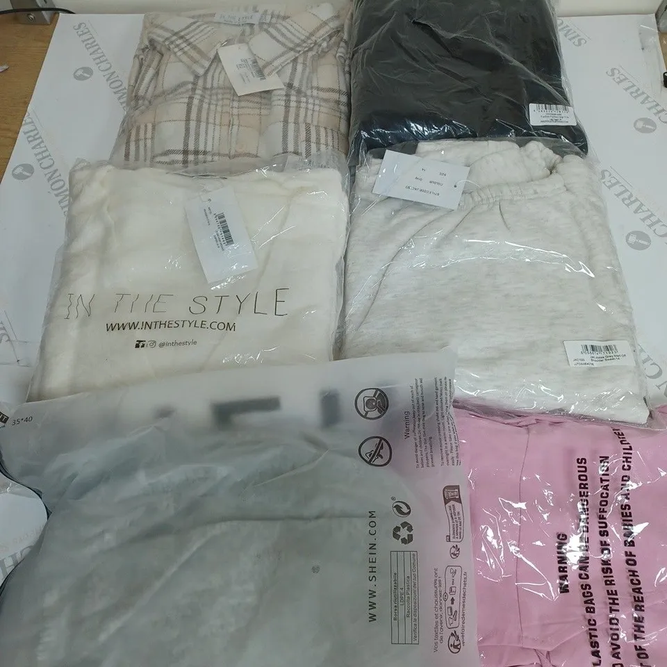 LARGE BOX OF ASSORTED CLOTHING ITEMS IN VARIOUS COLOURS AND SIZES INCLUDING TROUSERS , TOPS AND JUMPERS 