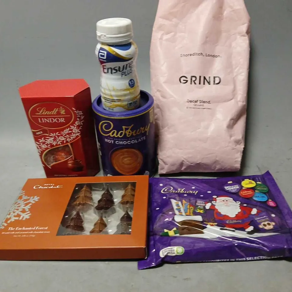 TOTE OF ASSORTED FOOD AND DRINK ITEMS TO INCLUDE COFFEE, CADBURYS AND LINDT