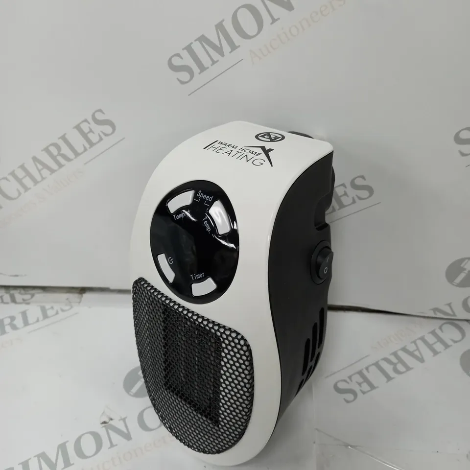BOXED 500 WATT PLUG-IN HEATER