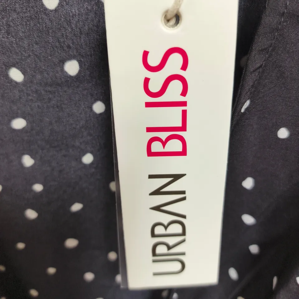 BOX OF APPROXIMATELY 50 URBAN BLISS WOMEN'S BLACK POLKA DOT WRAP BLOUSE WITH TIE-WAIST - SIZES 8 / 10 /12 / 14 