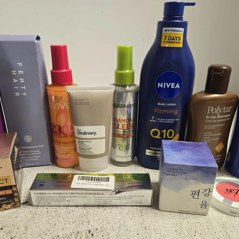 APPROX 12 ASSORTED BEAUTY PRODUCTS TO INCLUDE FENTY HAIR TREATMENT, GARNIER SMOOTHING SPRAY, NIVEA BODY LOTION, ETC