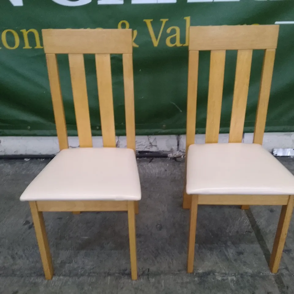 SET OF 2 NEW CHESTER OAK DINING CHAIRS (IVORY LEATHER SEAT PAD)