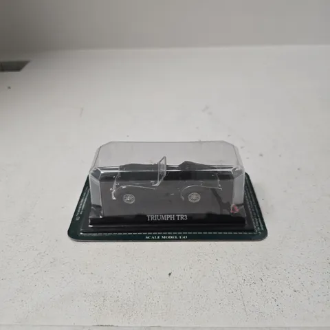 TRIUMPH TR3 1:43 SCALE MODEL CAR – DIE-CAST IN DISPLAY CASE