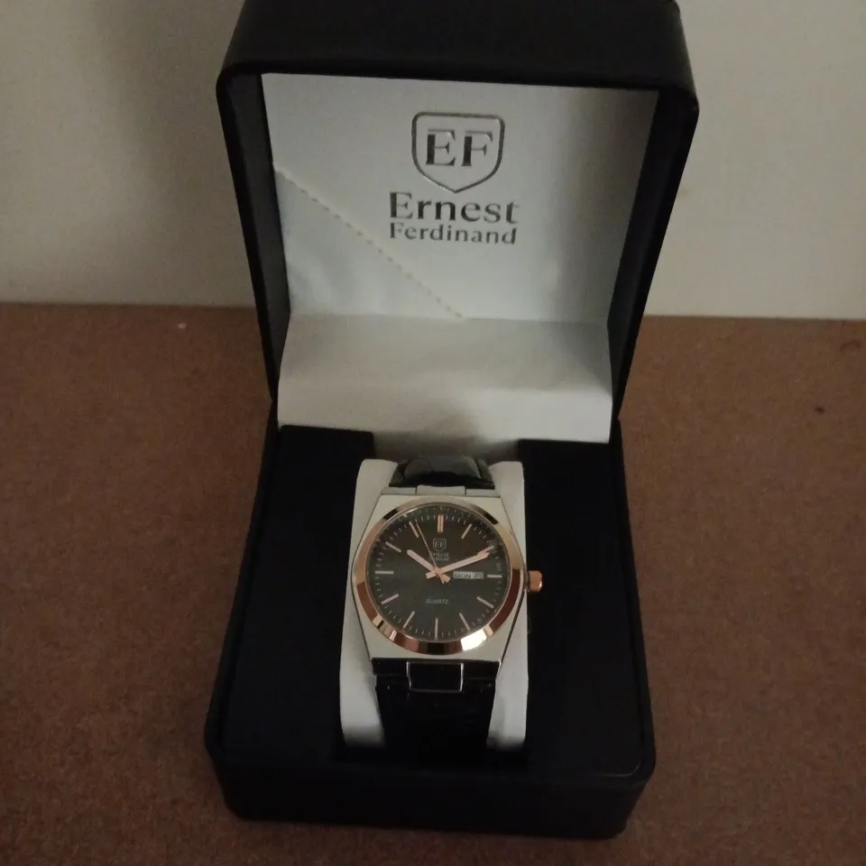 ERNEST FERDINAND STAINLESS STEEL DATE DIAL WATCH WITH BLACK DIAL & BLACK LEATHER STRAP