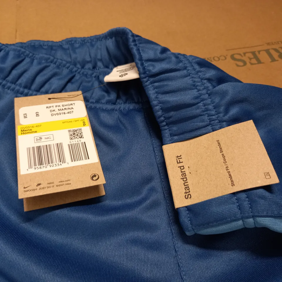 NIKE STANDARD FIT TAPE SHORTS IN BLUE - S