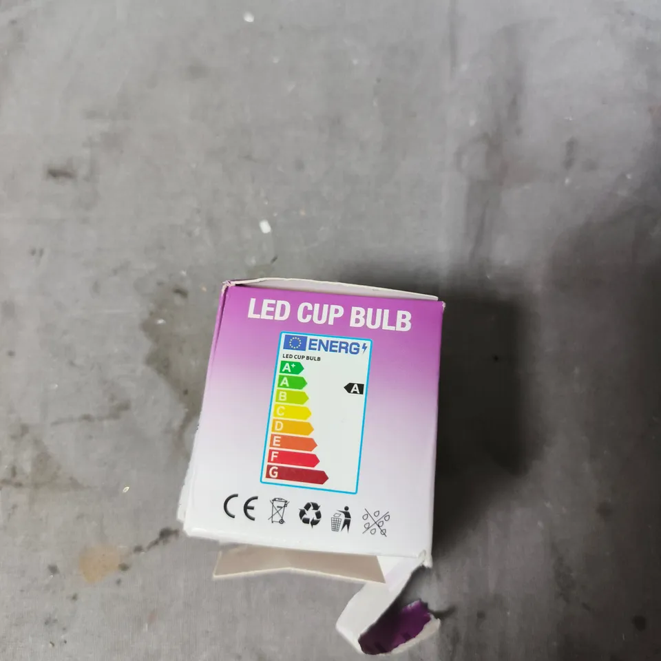 APPROXIMATELY 10 ASSORTED ITEMS INCLUDING TEA LIGHTS , LED CUP BULB AND VILLAGE MELTS